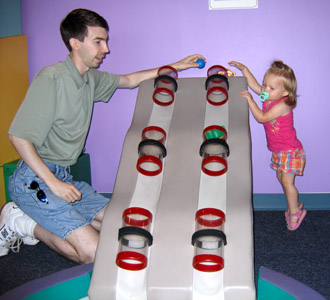 Trying out different rolling objects with Daddy